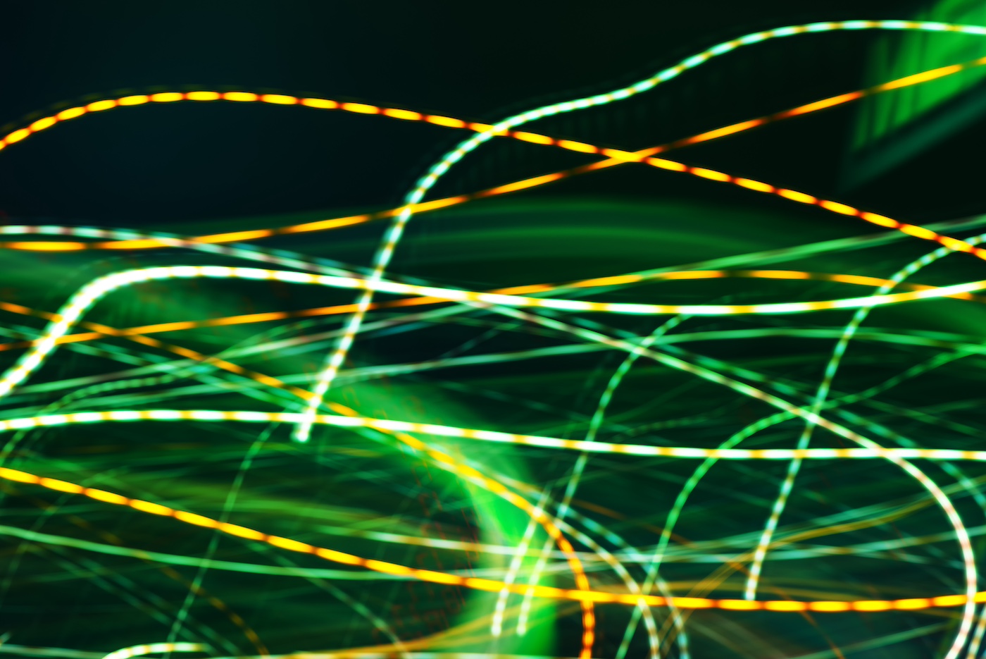 Abstract long exposure image of colorful city street light as urban background