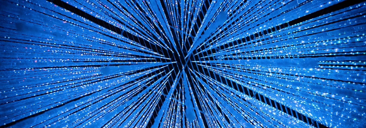 Full frame shot of illuminated decoration. Low angle view of blue lighting equipment in museum.